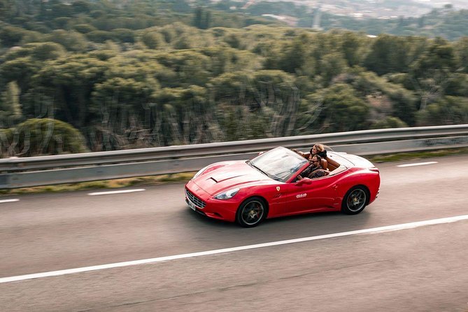 90-min Barcelona Supercar City Tour to Tibidabo - Driving From Barceloneta Toward Tibidabo’s Summit