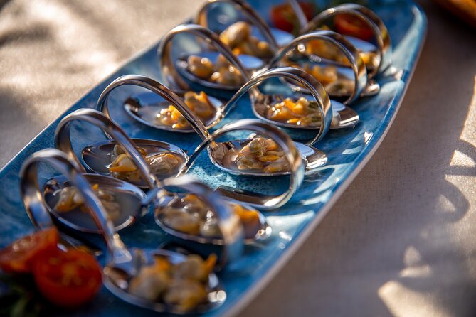 A 2 hours Local Tapas and sailing adventure in Barcelona - What you eat and drink: Espinaler, seafood conserves, and charcuterie