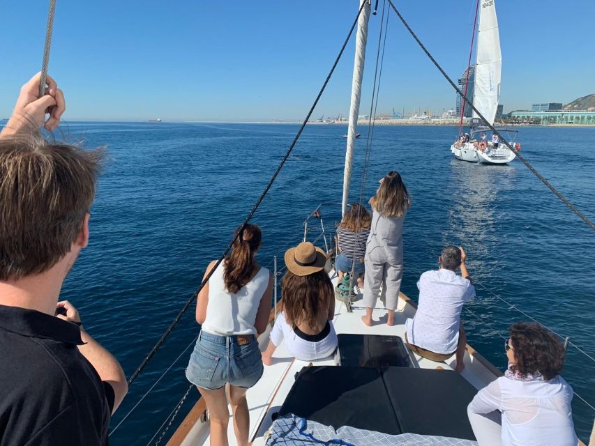 Barcelona: 2-Hour Sailboat Tour with Paddle Boarding - Coastal views: Sagrada Familia, Torre Agbar, Tibidabo, and Montjuïc from sea level