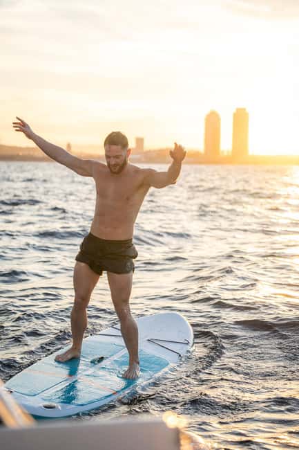 Barcelona Badalona : Sailboat Tour, Snacks, Drinks, Swimming - Key moments that make this tour worth it