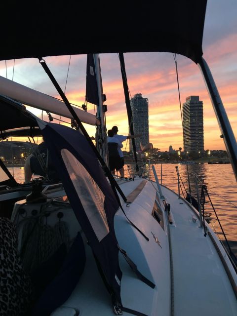 Barcelona: Boat trip with cava in amazing sailboat - Old City Barcelona at sunset: why that timing matters