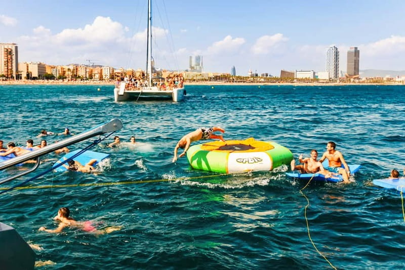 Barcelona: Catamaran Party Cruise with BBQ Meal - The 3-Hour Game Plan: Cruise Out, Swim at Badalona, BBQ, Cruise Back
