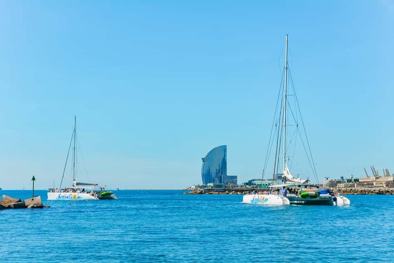 Barcelona: Catamaran Party Cruise with BBQ Meal - Badalona Swim Stop: Your Main Event, With Real Safety Timing