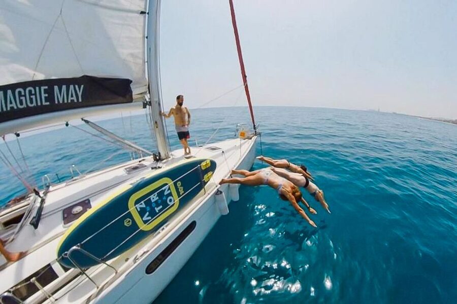 Barcelona: Coastline Boat Trip with Snacks and Cava - The swimming break: crystal-clear water and the real test of conditions