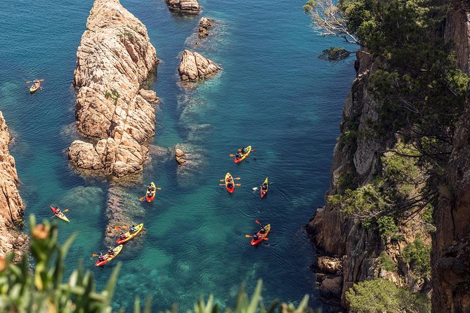 Barcelona Costa Brava Kayak, Snorkel & Cliff Jump Day Tour - The Kayak Portion: Under Camino de Ronda, Past Coves and Caves