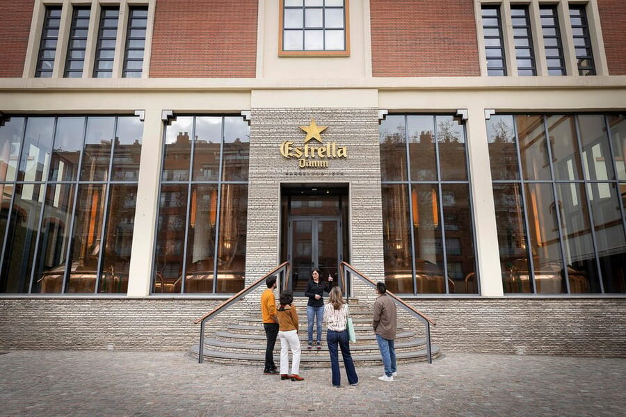 Barcelona: Estrella Damm Old Brewery Tour with Tasting - Walking Into the Estrella Damm Old Brewery in Central Barcelona