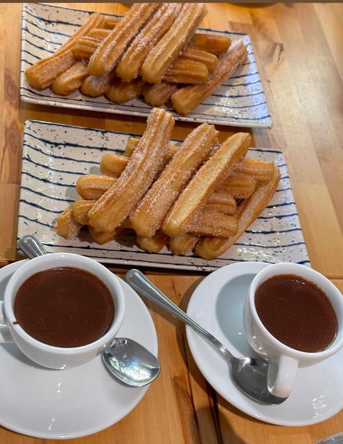 Barcelona: Experience the Best Churros with Hot Chocolate - How the churro tasting flows, from plain to spice specialties