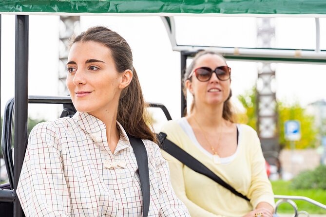 Barcelona Expert Tour with Local Guide in Eco Tuk Tuk Private - The port and beach stretch: Old Port, Barceloneta, Olympic-era energy