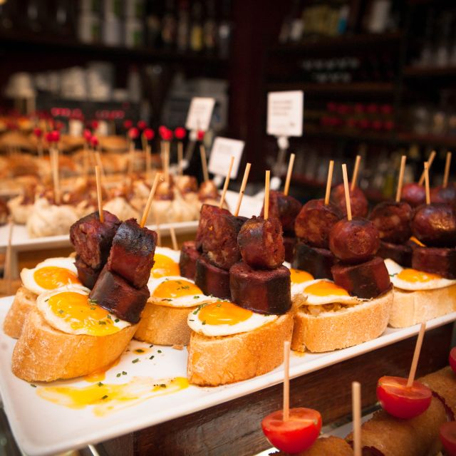 Barcelona: Food & Drink Tasting Tour in Traditional Taverns - Drinks included: wine, beer, and hot chocolate pairings