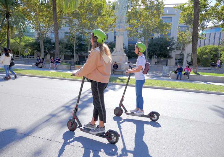 Barcelona: Gaudi Highlights Guided Tour by Electric Scooter - Barceloneta to the beach strip, with Mirador del Mediterrani W and sea-level views