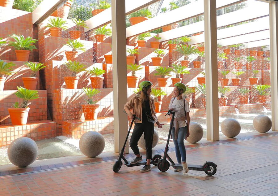 Barcelona: Gaudi Highlights Guided Tour by Electric Scooter - Arc de Triomf and Parc de la Ciutadella: a break from concrete, with stories attached