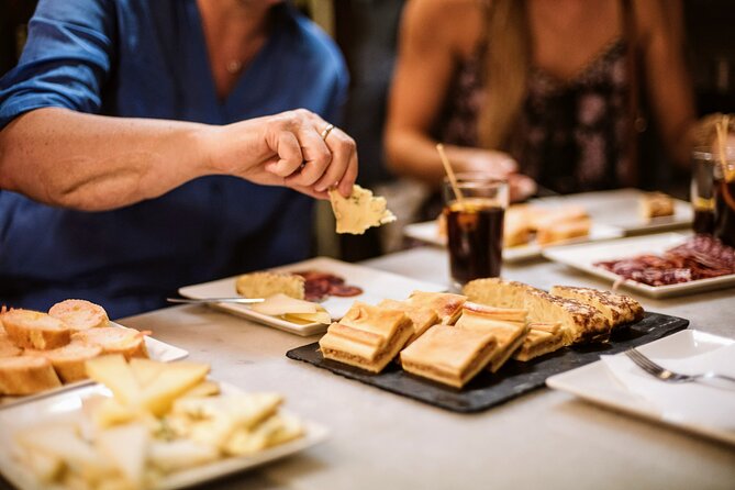 Barcelona Gothic Quarter Tapas & Taverns Food & Wine Tour - Placeta del Pi Tapas Start: Cured Meats, Cheeses, and a Potato Classic