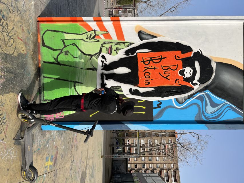 Barcelona: Graffiti E-Scooter Tour - Starting at Robot City office and getting geared up