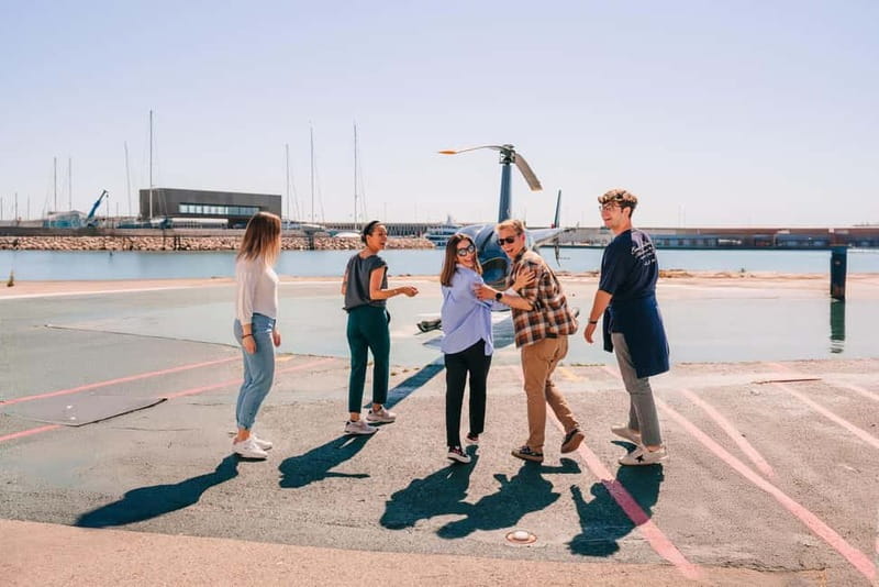 Barcelona: Helicopter, Boat Ride & Old Town Private Tour - The helicopter flight: 6 minutes over Port Vell, Barceloneta, and the Olympic Port