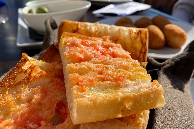 Barcelona Historic Walking Tour and Food Experience - Medieval palaces and churches: how the neighborhood shaped power