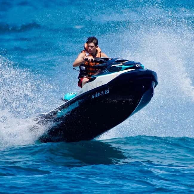 Barcelona: Jet Ski Ride 1 or 2 People w/ Instructor Included - Brutal WaterSports Check-In: gear up and handle the deposit