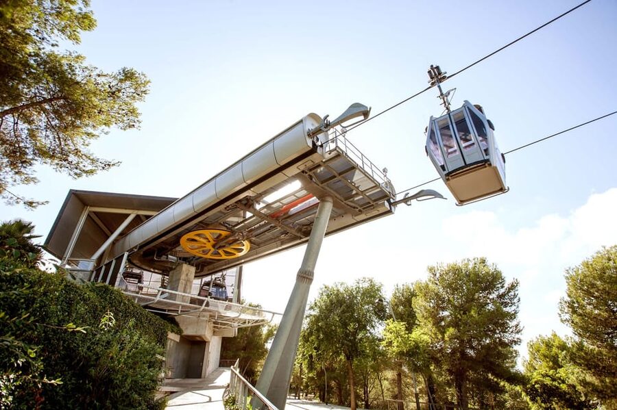 Barcelona: Montjuïc Cable Car Roundtrip Ticket - Arriving at Castell de Montjuïc: Views First, Entrance Second