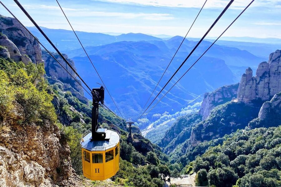 Barcelona: Montserrat Tour with Cog-Wheel & Black Madonna - Guided time at the Monastery: history, architecture, and living monks