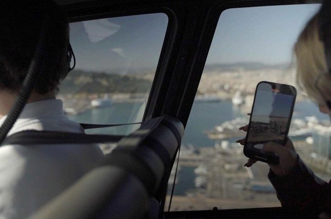 Barcelona Official Helicopter Tour with In-flight Video - Barceloneta and Mar Bella: Beach Geometry Is the Real Souvenir