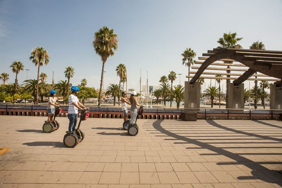 Barcelona: Old Port and Gothic Quarter Guided Segway Tour - Port Vell and the waterfront switch: yachts, beach frontage, and sea air