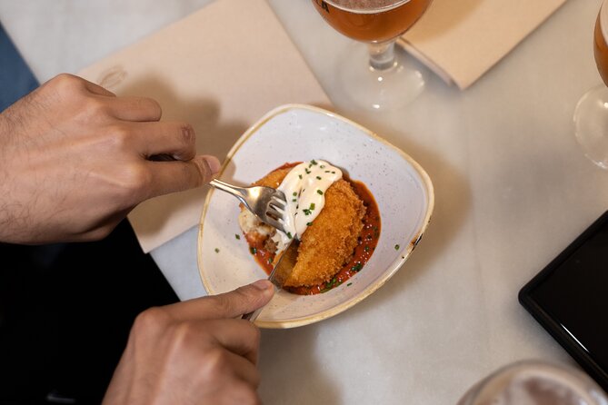 Barcelona Old Town Tapas Tour: Vermouth, Bites & Hidden Gems - Plaça Sant Felip Neri: a quiet square with a dark story