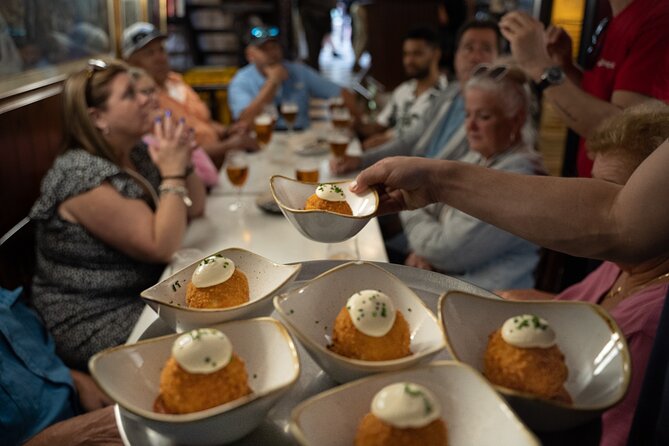 Barcelona Old Town Tapas Tour: Vermouth, Bites & Hidden Gems - Barcelona City Hall and a surprise local sweet