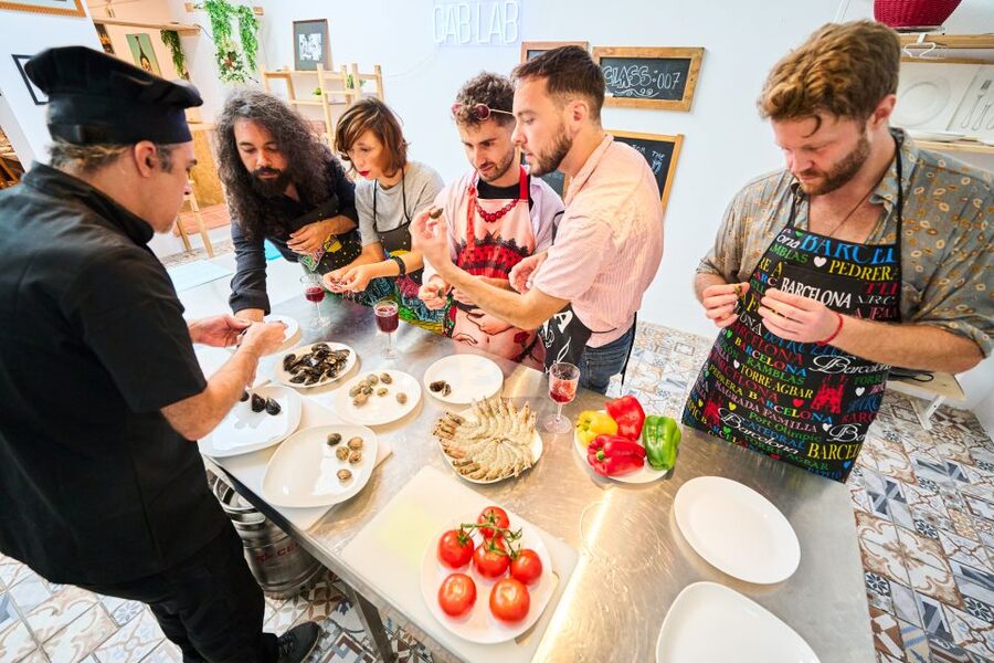 Barcelona: Paella Cooking Class with Market Visit and More - What You Cook: Seafood, Chicken, or Vegetarian Paella Options