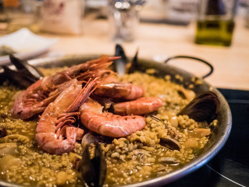 Barcelona: Paella Cooking Workshop and Market Tour - The meal part: unlimited drinks, recipes, and a relaxed finish