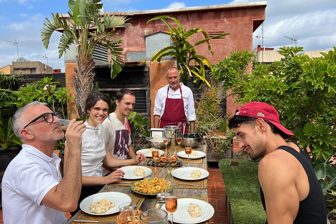 Barcelona: Rooftop Tapas & Sangria class with a Local Chef - The Rooftop Terrace Meal: Views Over Port Vell and the Sea
