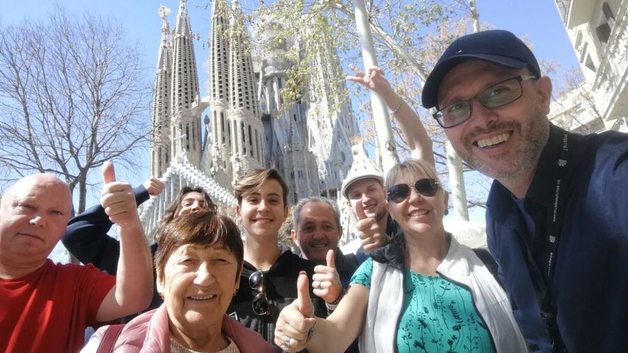 Barcelona: Sagrada Familia and City Tour with Hotel Pickup - Entering La Sagrada Familia with reserved entry and real symbolism