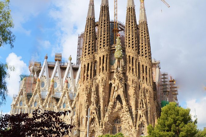 Barcelona: Sagrada Familia Fast Track Tour with Tower Option - Tower access: views, elevator up, stairs down, and weather rules