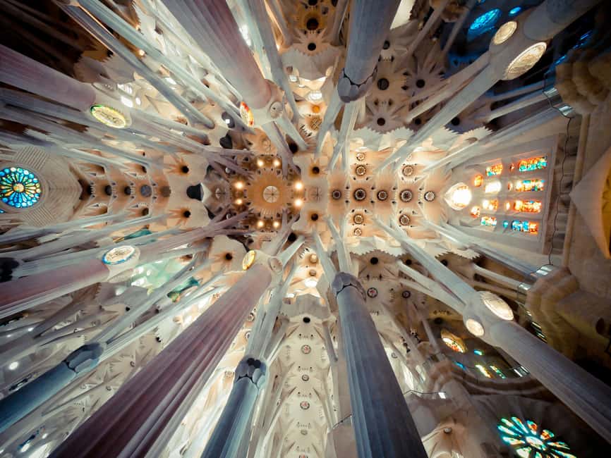 Barcelona: Sagrada Familia Guided Tour with Tickets - Inside the basilica: five naves, 36 columns, and a forest you can walk through