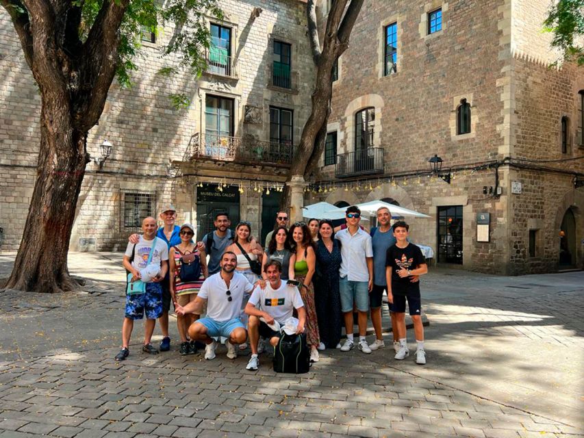 Barcelona: Sagrada Familia, Modernism, and Old Town Tour - Plaça de Catalunya and the Bridge to the Medieval Core