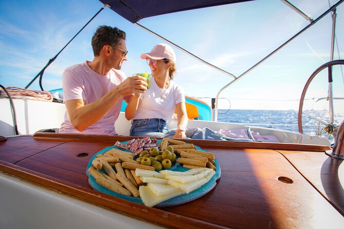 Barcelona Sailing Experience: Spanish Tapas and Premium Open Bar - Swim stop reality check: when conditions decide
