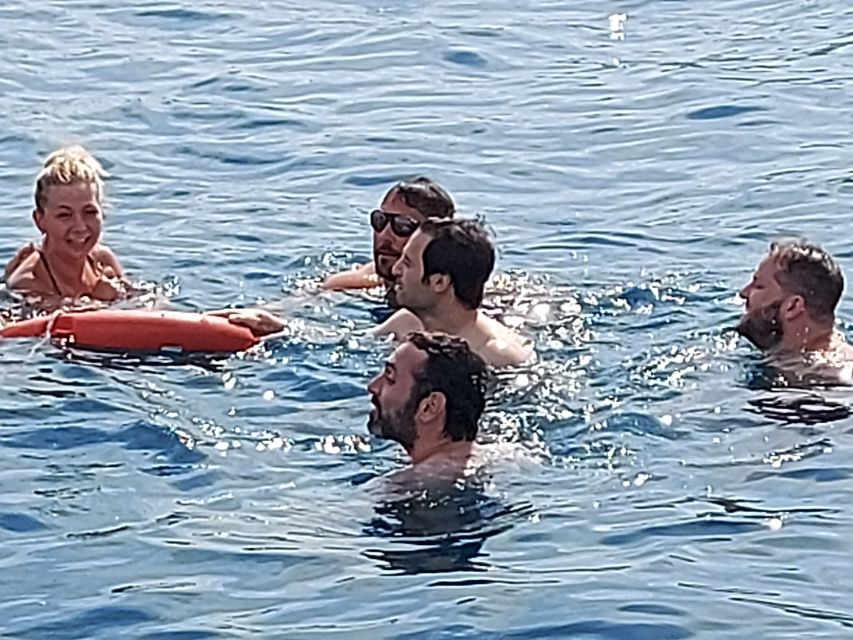 Barcelona Sailing Tour Drinks, snacks Swim & Stunning Views - Port Olímpic Check-In and Finding the Right Boat