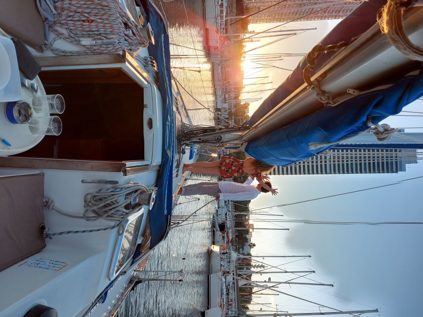 Barcelona Sailing Tour Drinks, snacks Swim & Stunning Views - Aperitif Time: Open Bar, Catalan Snacks, and Relaxed Photo Moments