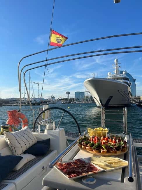 Barcelona: Sailing Tour + Food, Drinks, Swim & Sunset Option - Hands-on sailing: help the skipper steer, or just enjoy the ride