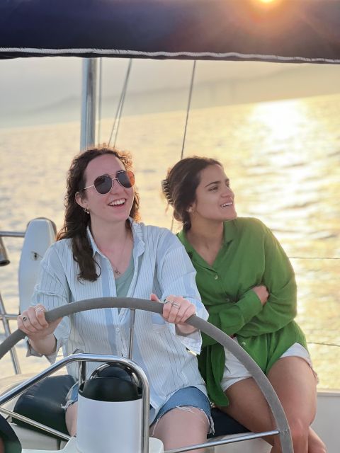 Barcelona: Sailing Tour with a Glass of Cava - Hoisting the mainsail and genoa, then sailing toward the November buoy