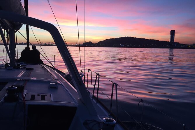 Barcelona: Sailing Tour with Tapas, Drinks, Swim & Sunset Option - Cava and seafood tapas on deck, no restaurant detours