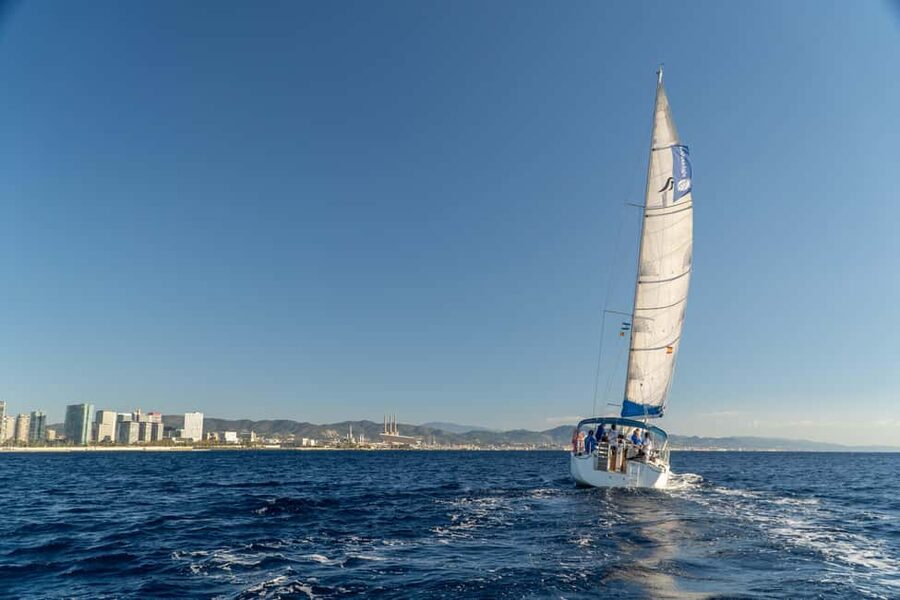 Barcelona: Sailing with Open Bar, Catalan Snack & Swim Stop - Open bar drinks, Catalan snacks, and the on-deck vibe