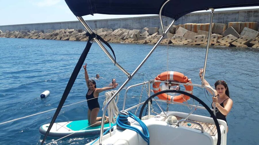 Barcelona: Shared cruise on a catamaran Drink+Local Tapa - Montjuic to the Forum skyline, where the city turns futuristic