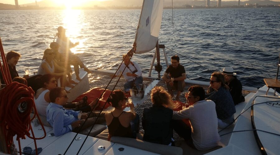 Barcelona: Shared cruise on a catamaran Drink+Local Tapa - La Barceloneta photo stop, and the coast’s real shape