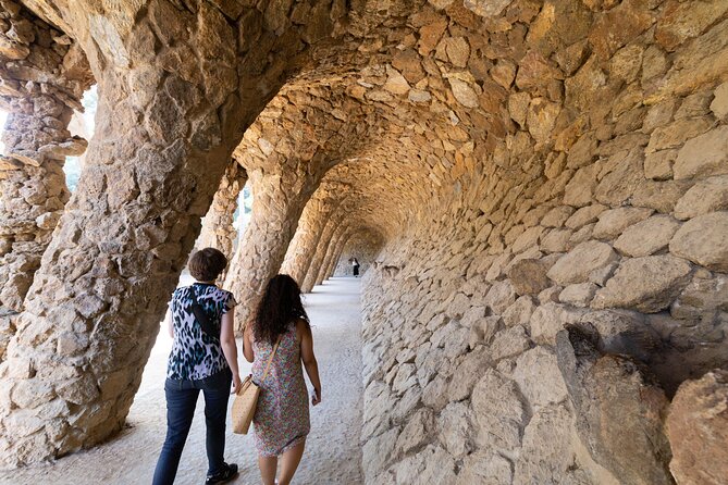 Barcelona: Skip-the-Line Gaudi's Park Guell Guided Tour - Serpentine Bench and El Drac: where Gaudí’s style becomes real