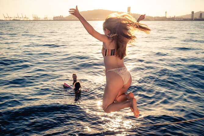 Barcelona Sunset Cruise with Light Snacks and Open Bar - Golden hour sailing, plus the real weather check