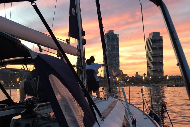 Barcelona Sunset Cruise with Open Bar of Cava and Snacks - The open bar experience: Cava, mineral water, and how it feels onboard