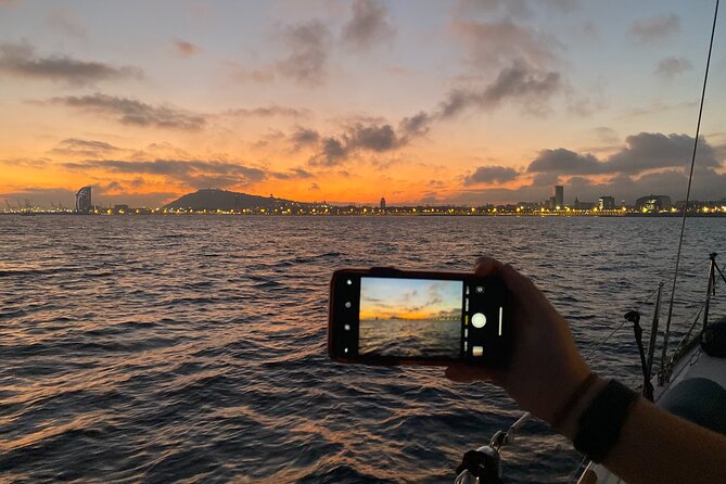 Barcelona Sunset Private Sailing with Live Saxophone and Open bar - Frank Gehry’s Gold Fish sculpture from the waterline