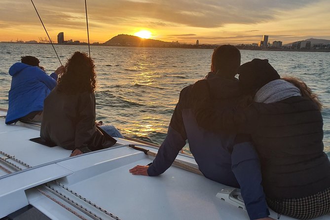 Barcelona Sunset Sailing Cruise from Port Olímpic with Open Bar - Maremagnum on pontoons, then the Olympic Towers skyline