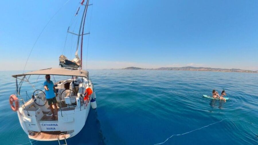 Barcelona: Sunset Sailing Experience with Snacks and Cava - Jump in the clear water: swim time, paddle board, and floating toys