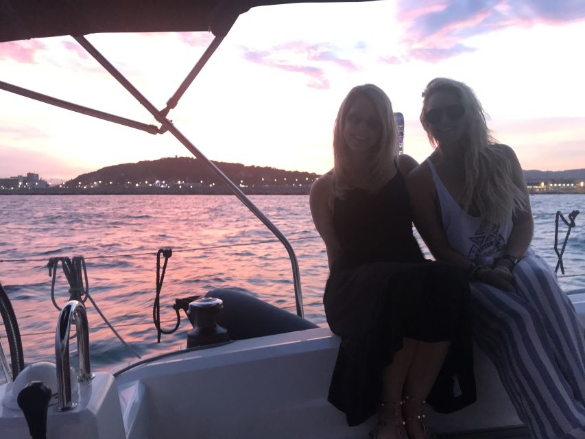 Barcelona: Sunset Sailing Tour with Open Bar & Snacks - Slide-by views: El Peix dOr and skyline first impressions