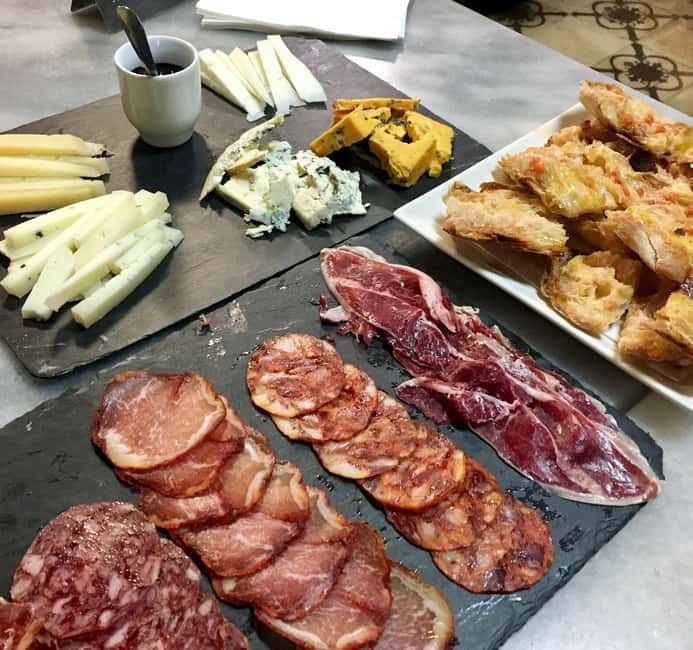 Barcelona Tapas Crawl food & drinks all included - Where to start outside Molino Theater (and why timing matters)